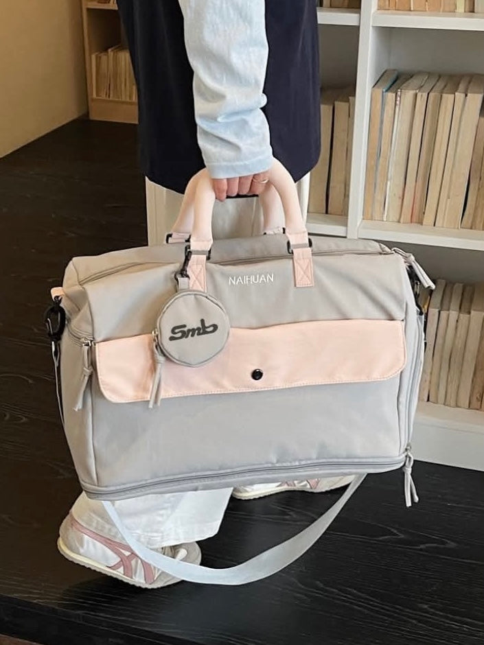 Grey-Pink — Sports Duffel Bag, front flap pocket open with a zip pouch, wallet and small case inside