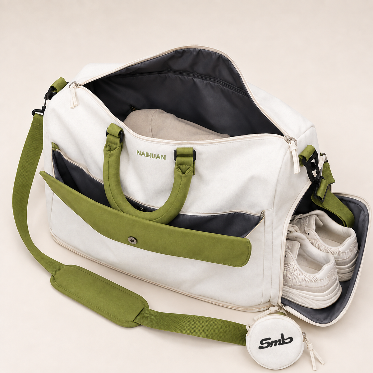 White-Green — Sports Duffel Bag, main compartment open and side shoe compartment unzipped with trainers inside