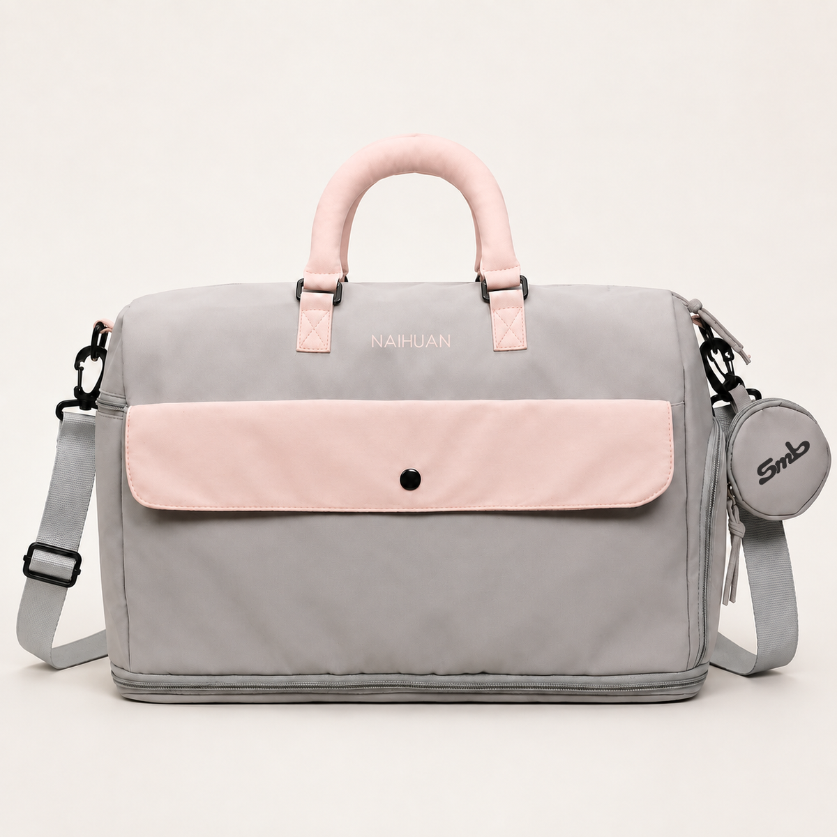 Grey-Pink — Sports Duffel Bag, front view with the detachable round pouch clipped to the strap
