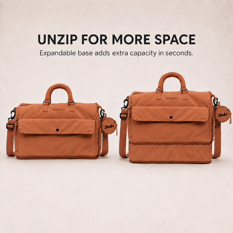 Orange — Sports Duffel Bag, unzip for more space: the expandable base adds extra capacity in seconds