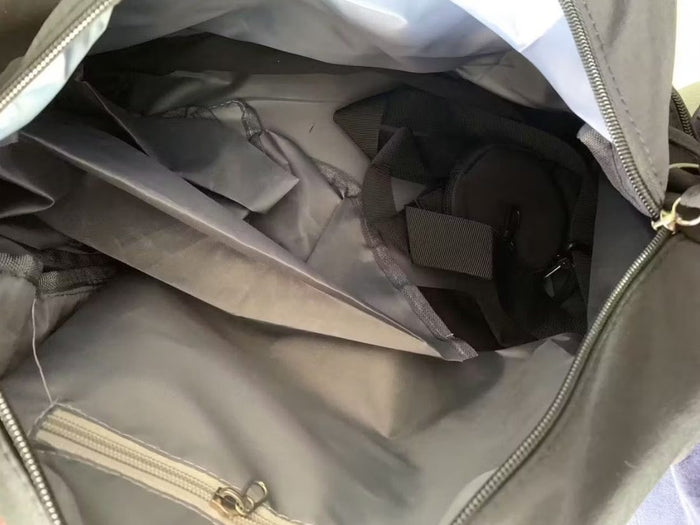 A buyer's photo of the lined interior and inner pocket